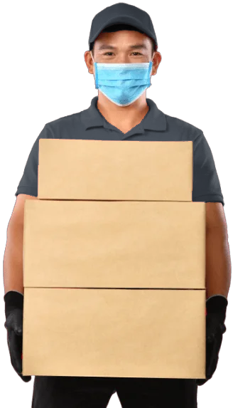 Guy holding boxes wearing a mask and gloves